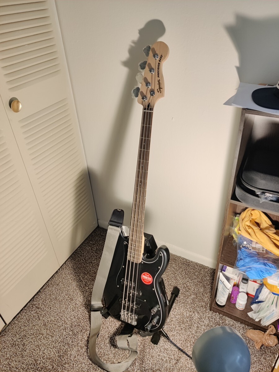 "Charcoal frost metallic" (grey and black) PJ bass in mint
condition