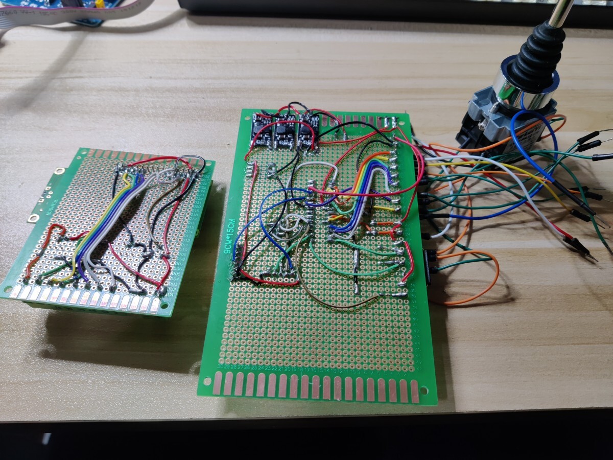 Two perfboards with messy wiring