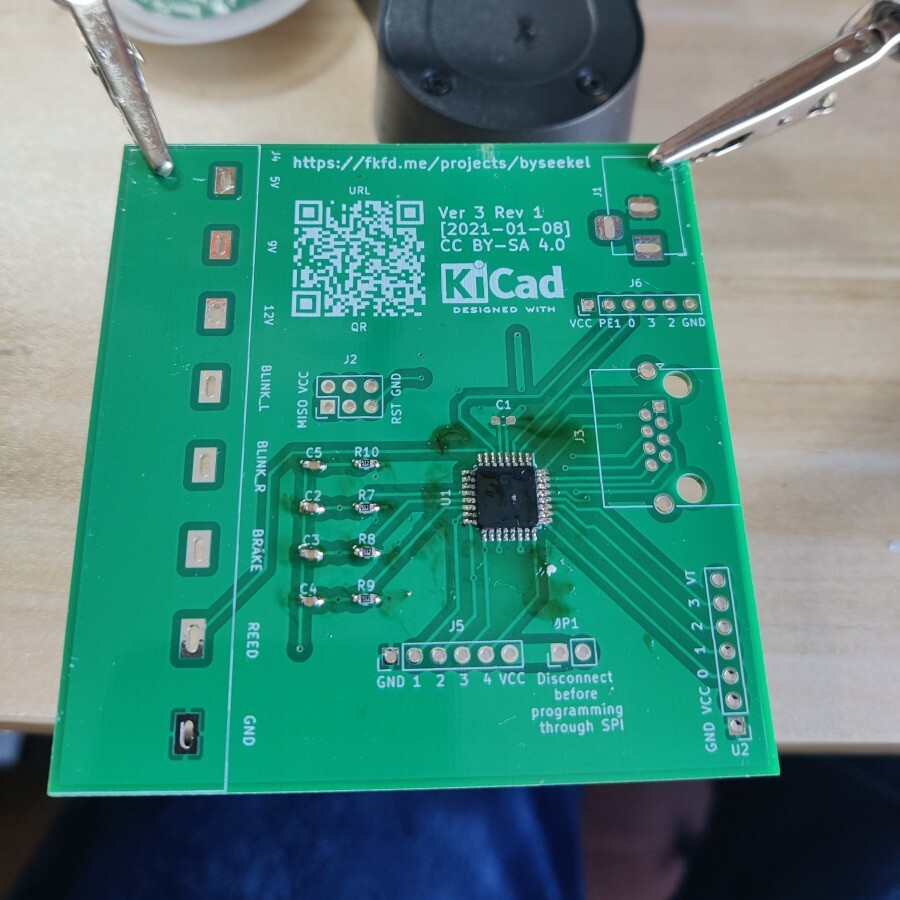 PCB with a freshly soldered chip