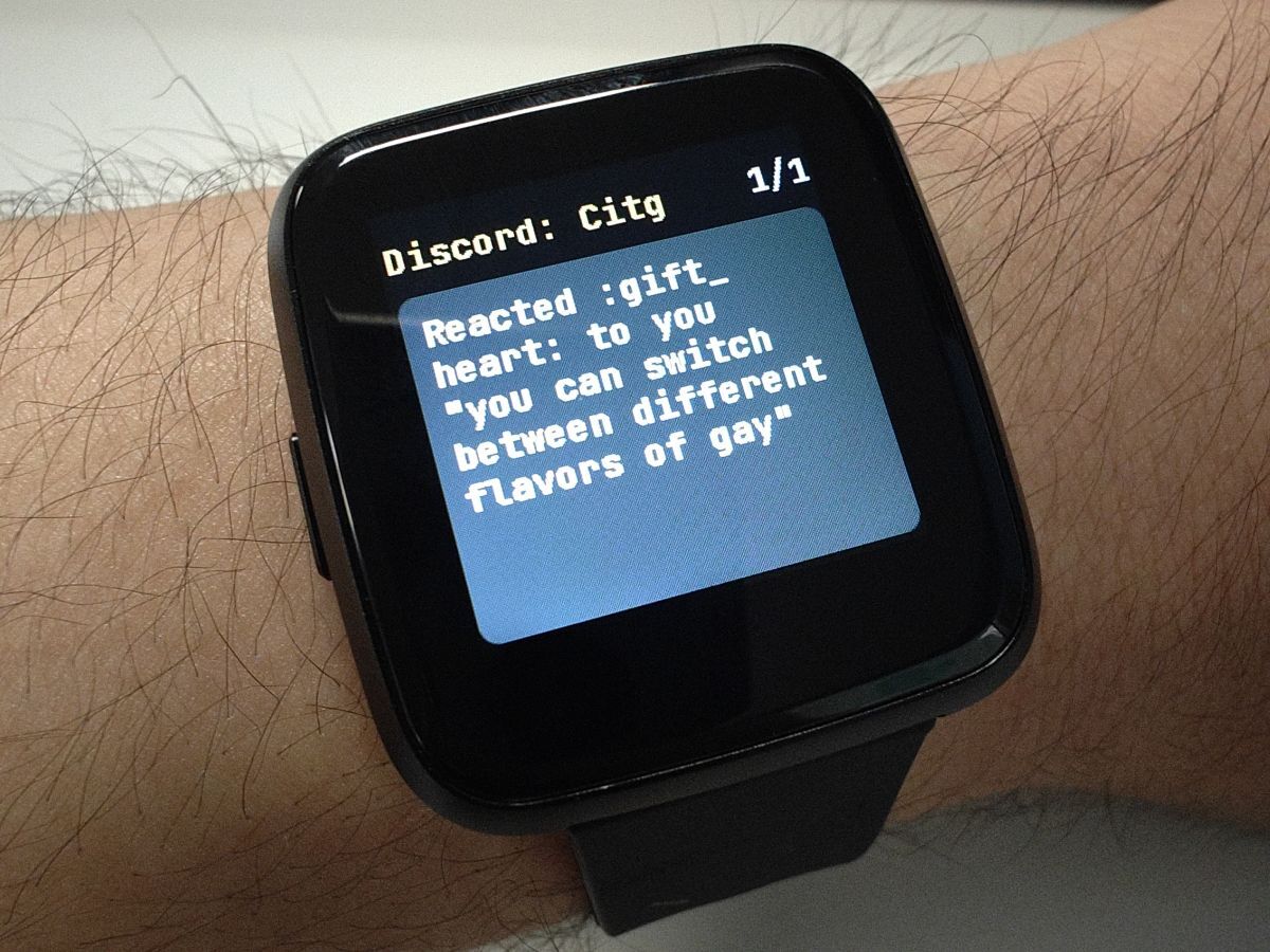 Smartwatch showing a notification of Citg reacting gift_heart to my message
"you can switch between different versions of
gay"