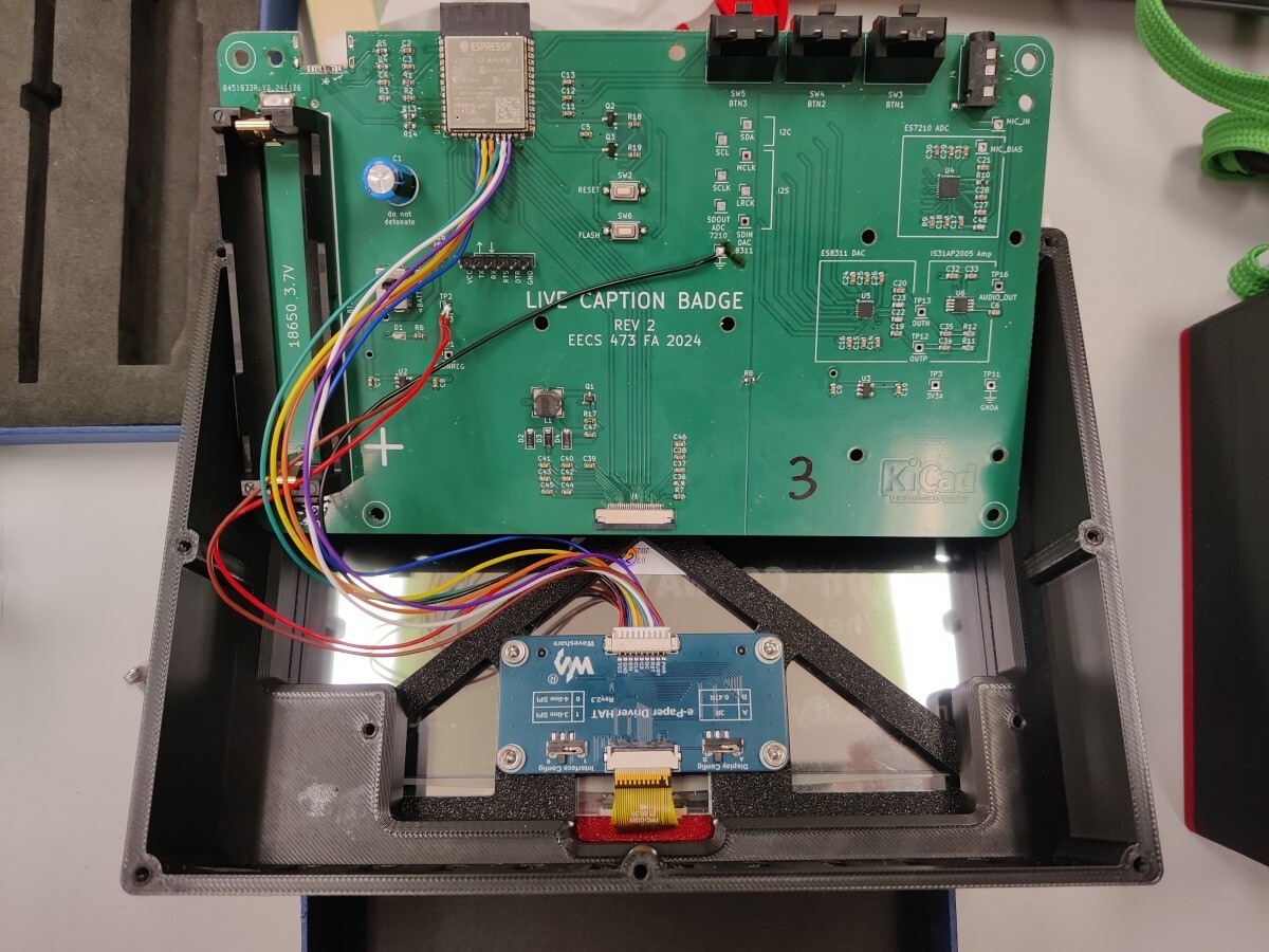 A PCB with wires running down to a breakout
board.