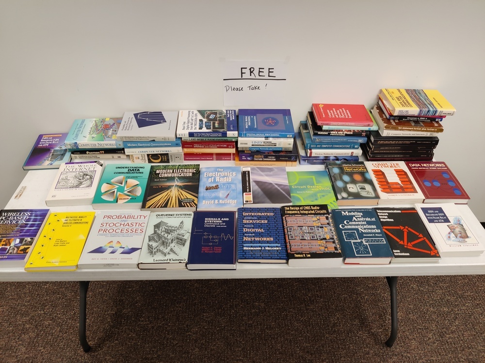 Piles of free books on a table